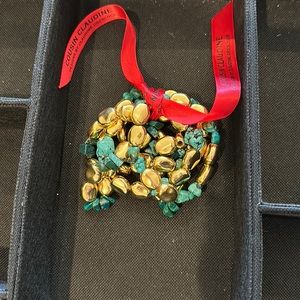 Cousin Claudine gold and jade green beaded bracelet set.